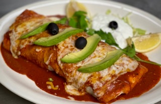 Mijares Mexican Restaurant signature dishes Two Cheese EnchiladasTwo Mijares EnchiladasTwo Crunchy TacosTaquitos con Guacamole